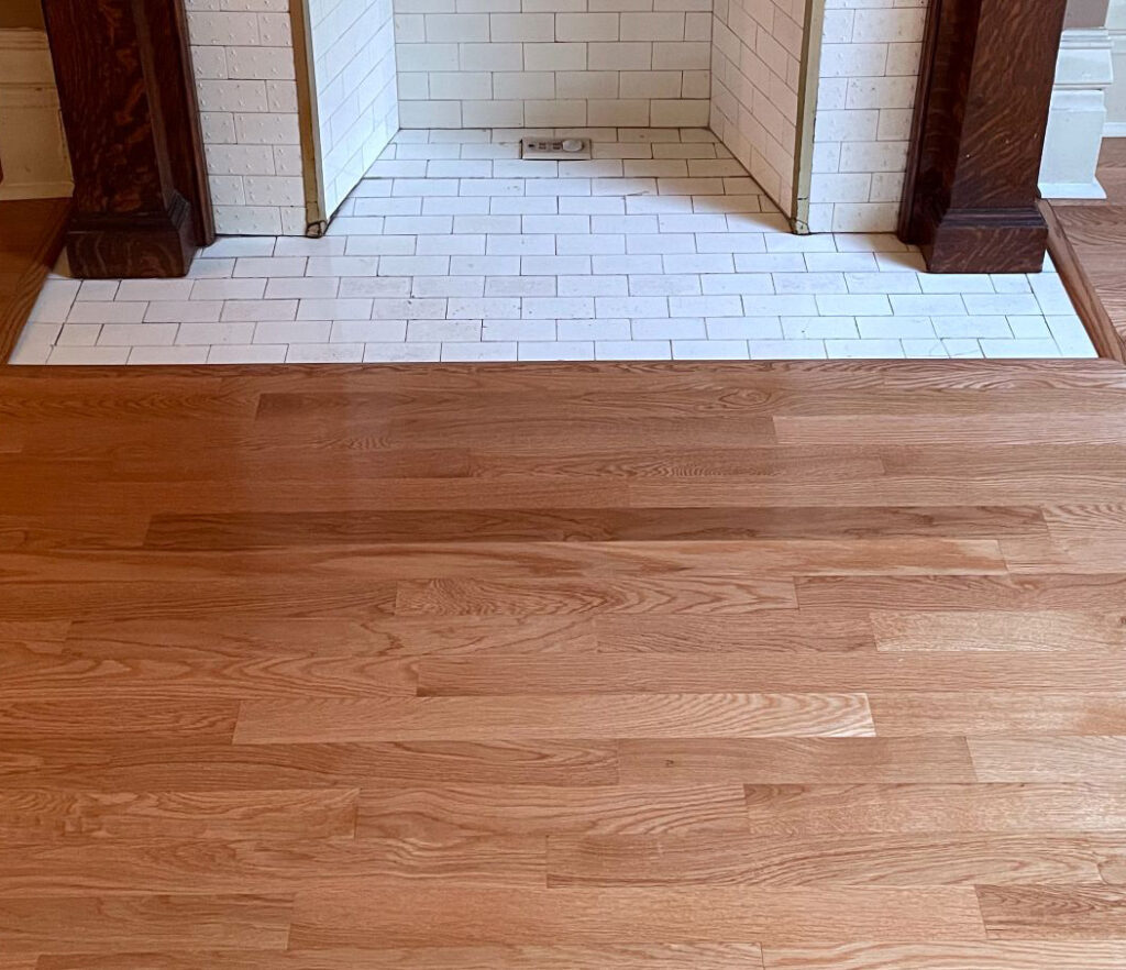 Floor installation around a fireplace